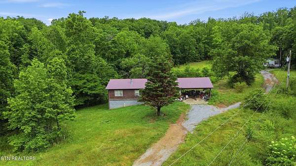 9.86 Acres of Land with Home for Sale in Lenoir City, Tennessee