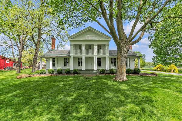 27.6 Acres of Land with Home for Sale in Dexter, Michigan