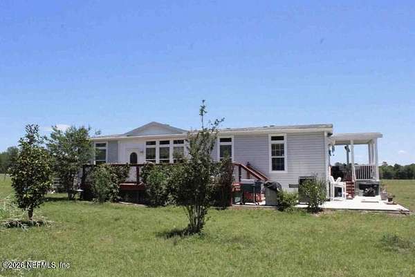 17.8 Acres of Land with Home for Sale in Brooker, Florida