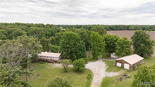 35 Acres of Recreational Land with Home for Sale in Bunker Hill, Illinois