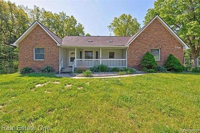 2.5 Acres of Land with Home for Sale in Ortonville, Michigan