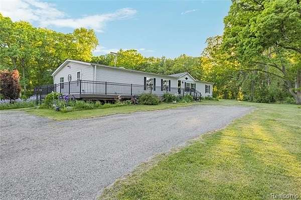 10 Acres of Recreational Land with Home for Sale in Holly Township, Michigan
