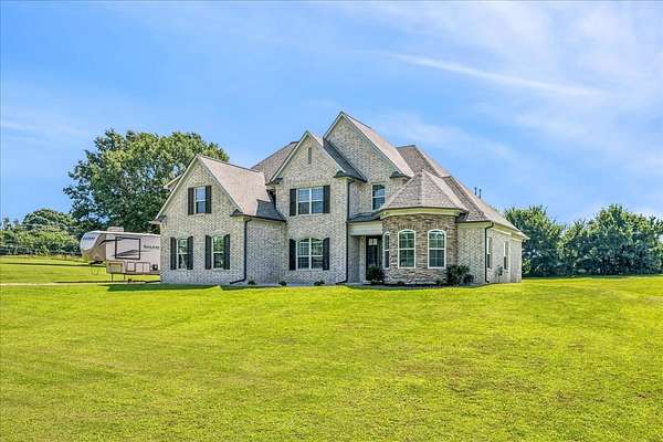 2 Acres of Land with Home for Sale in Drummonds, Tennessee