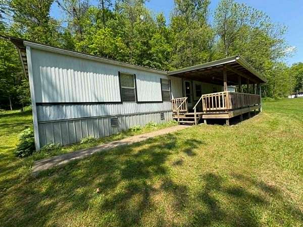 16.2 Acres of Land with Home for Sale in Gassaway, West Virginia