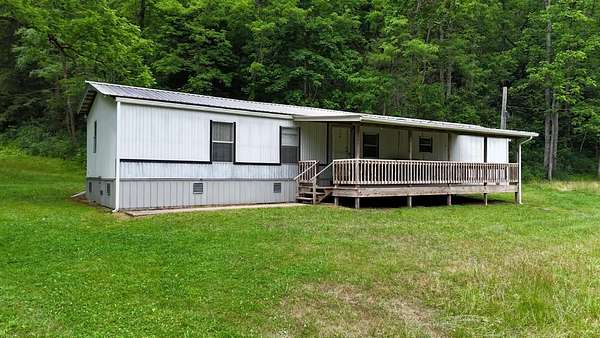 16.2 Acres of Land with Home for Sale in Gassaway, West Virginia