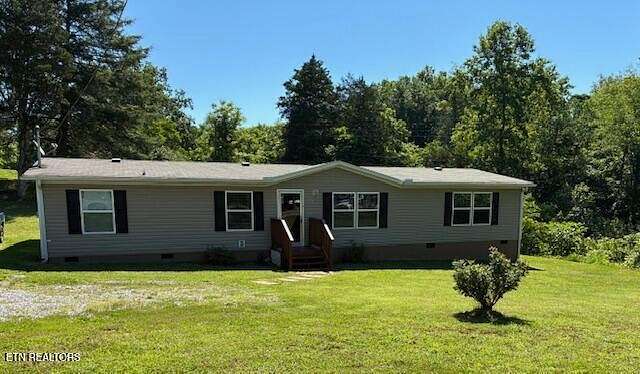 5.74 Acres of Land with Home for Sale in Kodak, Tennessee