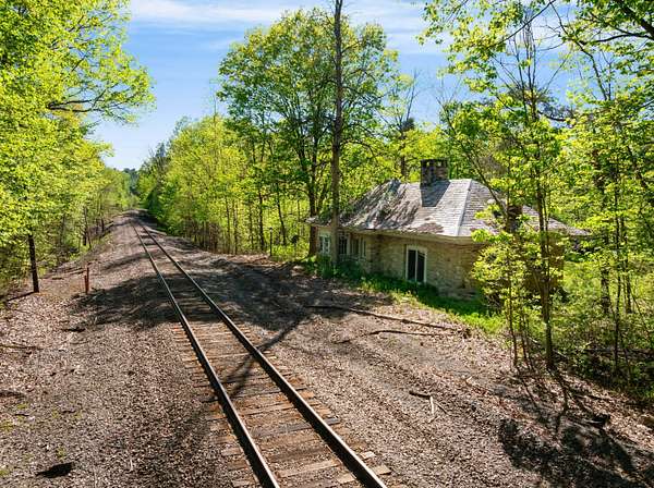 15.4 Acres of Land with Home for Sale in Essex, New York