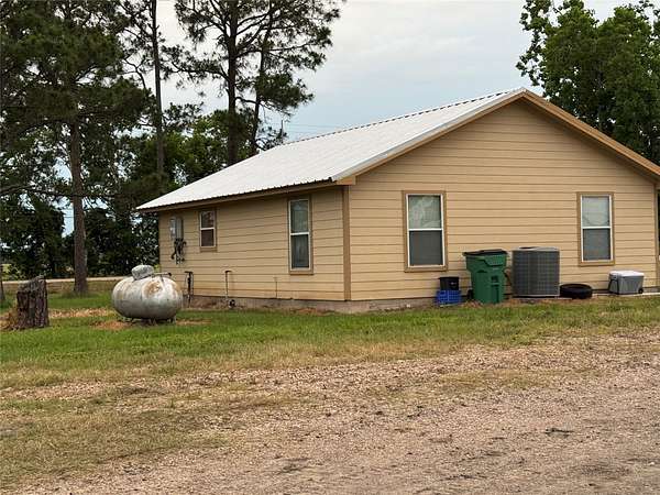 6.7 Acres of Land with Home for Sale in Rosharon, Texas