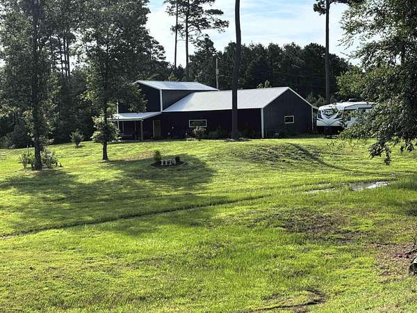 1.5 Acres of Land with Home for Sale in Sheridan, Arkansas