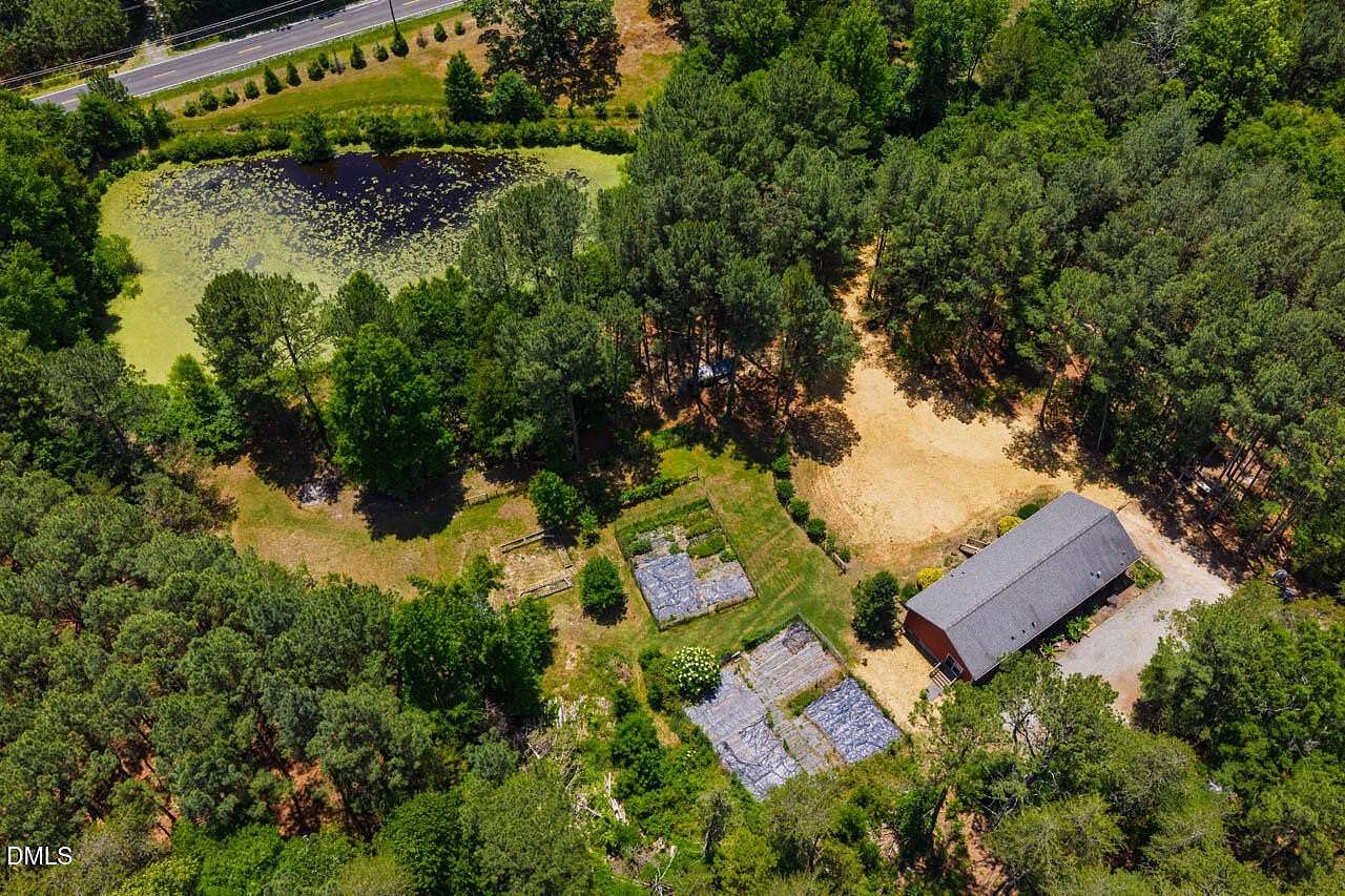 9.66 Acres of Land with Home for Sale in Graham, North Carolina