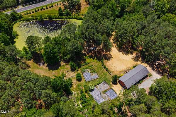 9.66 Acres of Land with Home for Sale in Graham, North Carolina