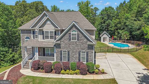 1.59 Acres of Land with Home for Sale in Sharpsburg, Georgia