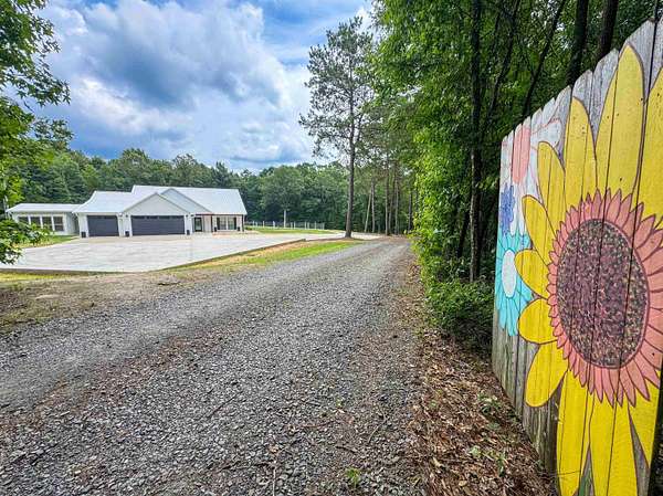 27.7 Acres of Recreational Land with Home for Sale in Atlanta, Texas