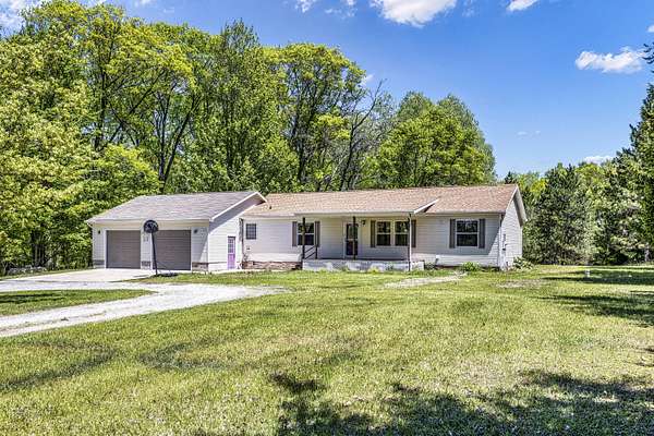 3.9 Acres of Land with Home for Sale in Roscommon, Michigan