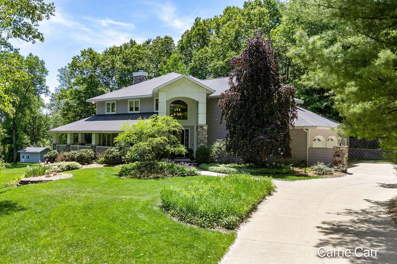 2 Acres of Land with Home for Sale in Comstock Park, Michigan