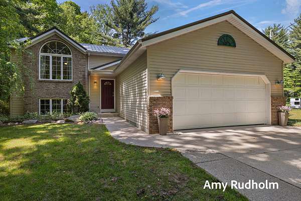 2.47 Acres of Land with Home for Sale in Coopersville, Michigan