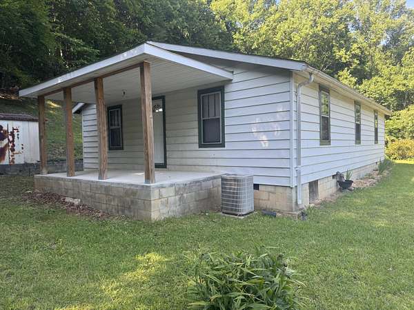 6 Acres of Land with Home for Sale in Williamsburg, Kentucky