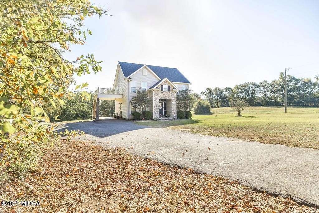 24.9 Acres of Land with Home for Sale in Forsyth, Georgia
