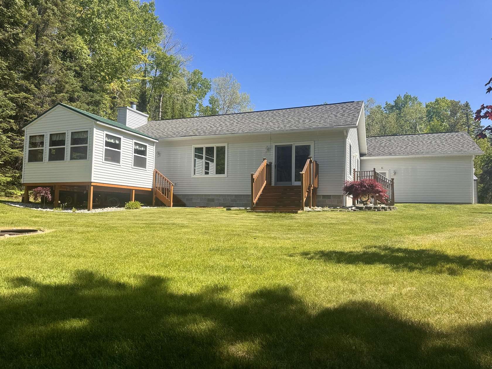 10 Acres of Recreational Land with Home for Sale in Barton City, Michigan