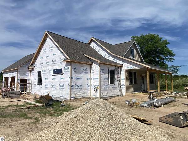 2 Acres of Land with Home for Sale in Rapid City, Michigan
