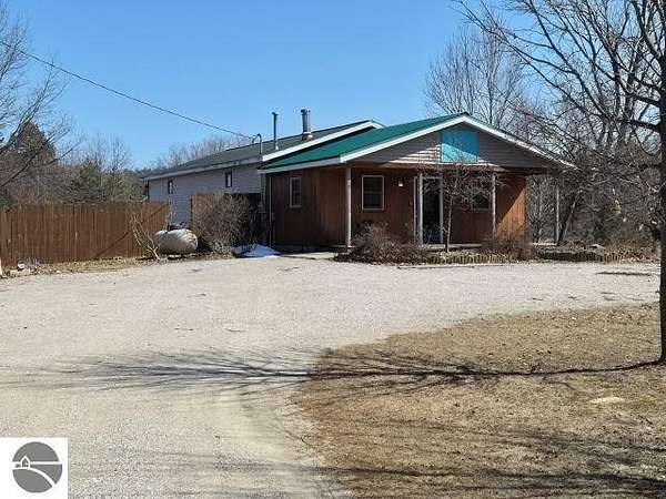 5 Acres of Improved Mixed-Use Land for Sale in Rapid City, Michigan