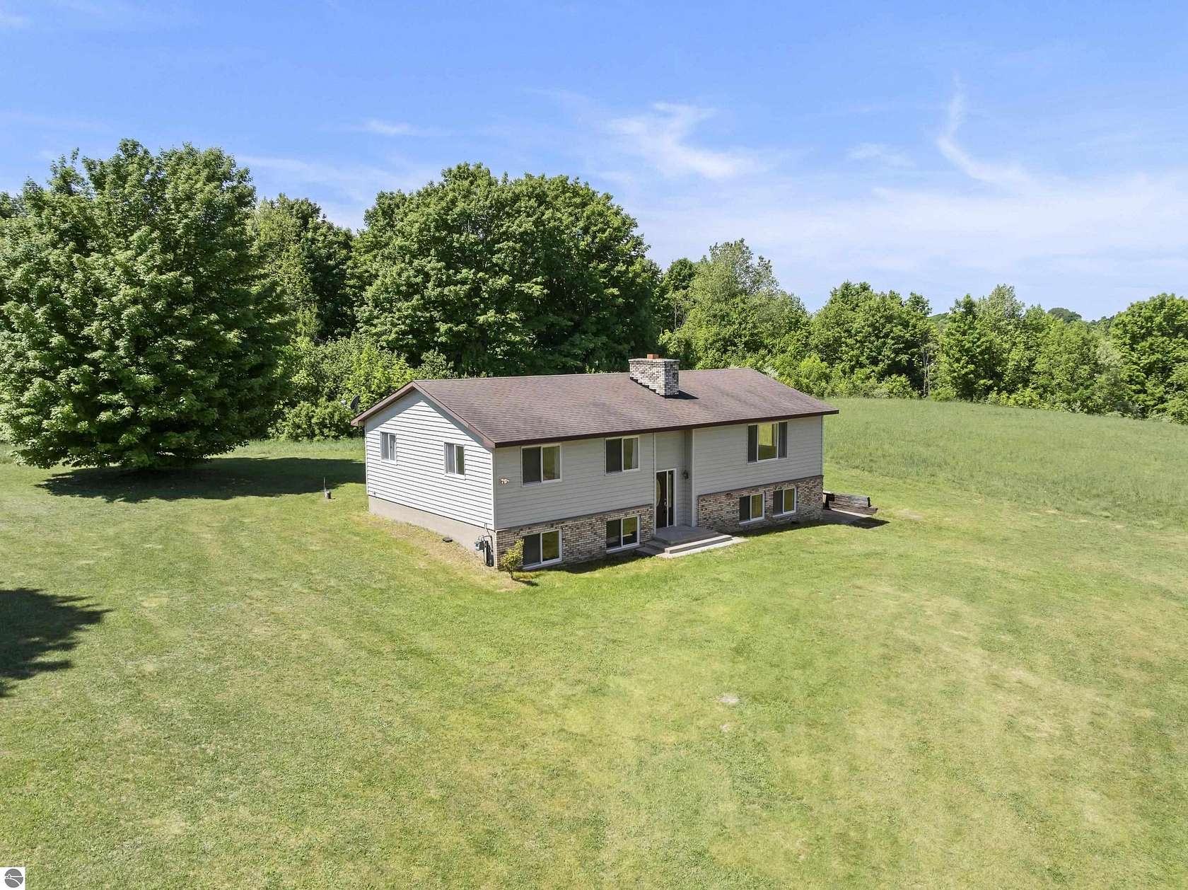 5 Acres of Land with Home for Sale in Benzonia, Michigan
