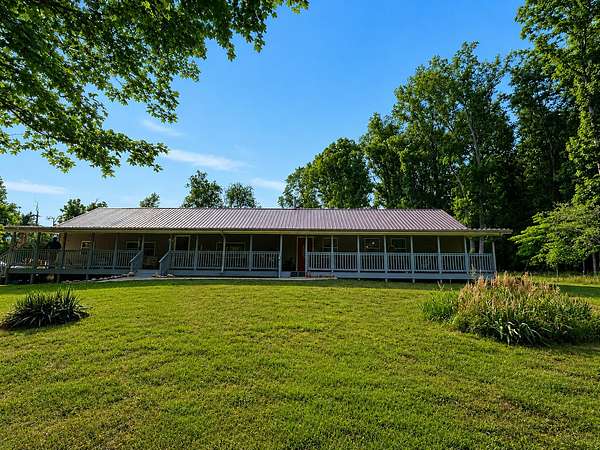 13.2 Acres of Land with Home for Sale in Erin, Tennessee