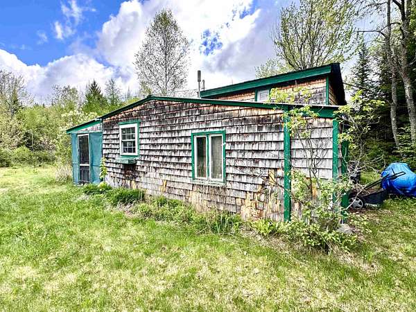 14 Acres of Recreational Land with Home for Sale in Columbia, New Hampshire