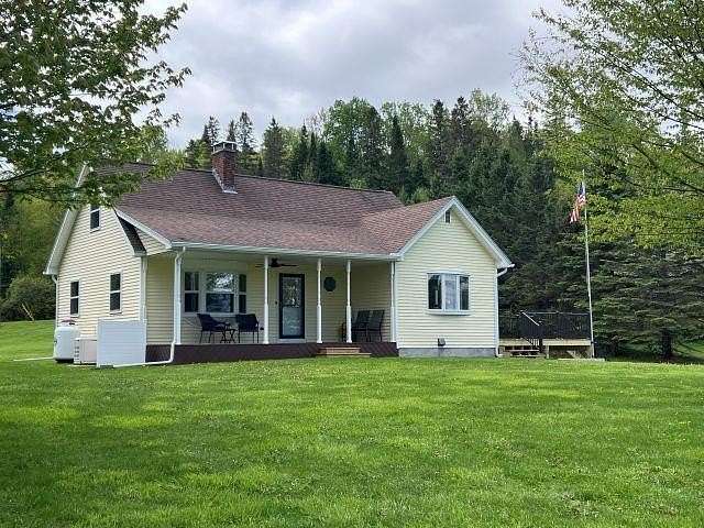 5.1 Acres of Land with Home for Sale in Colebrook, New Hampshire