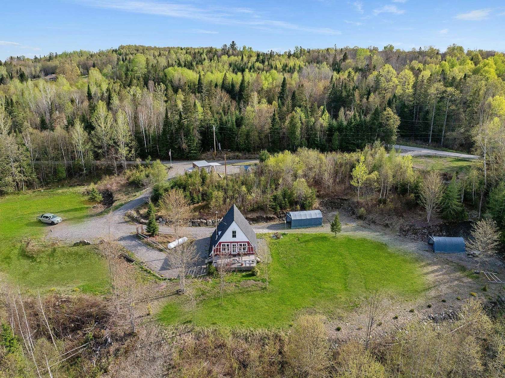5.42 Acres of Land with Home for Sale in Colebrook, New Hampshire