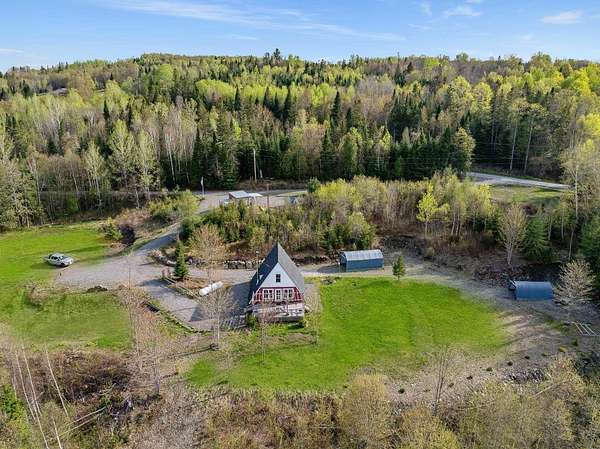 5.42 Acres of Land with Home for Sale in Colebrook, New Hampshire