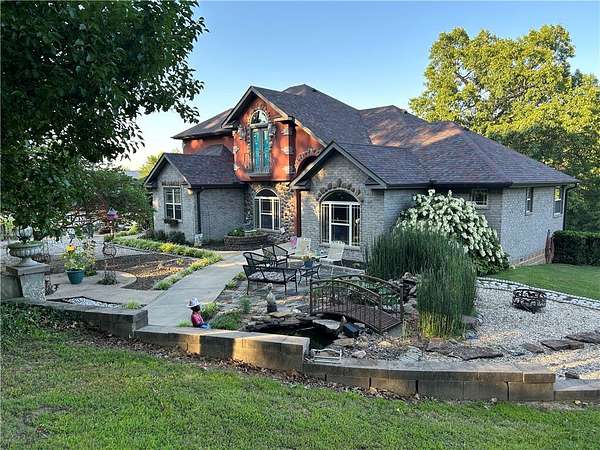 4 Acres of Land with Home for Sale in Gravette, Arkansas
