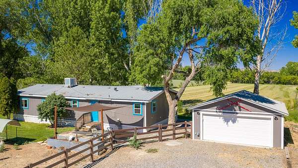 7.1 Acres of Land with Home for Sale in Fruita, Colorado