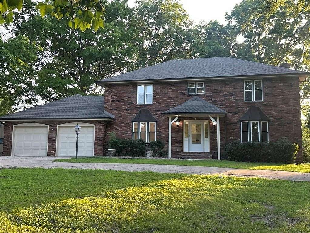 4.44 Acres of Land with Home for Sale in Country Club, Missouri