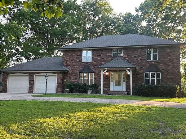 4.44 Acres of Land with Home for Sale in Country Club, Missouri