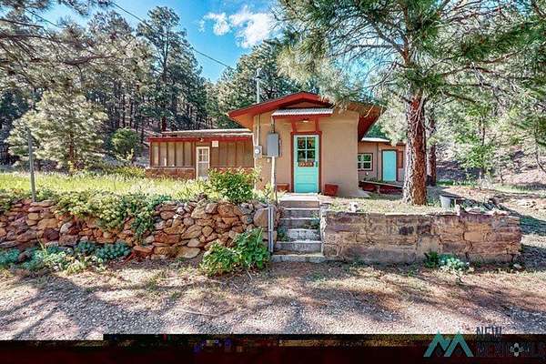 11 Acres of Land with Home for Sale in Montezuma, New Mexico