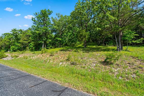1.66 Acres of Residential Land for Sale in Saddlebrooke, Missouri