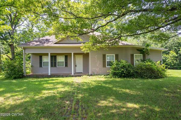 7.82 Acres of Land with Home for Sale in Mercer, Tennessee