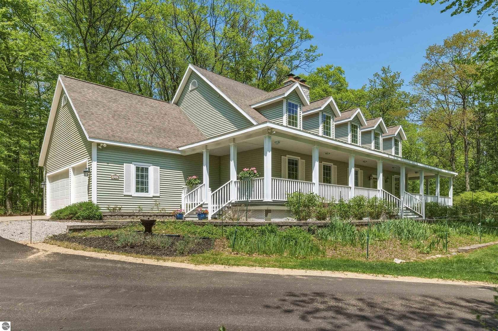 5.2 Acres of Land with Home for Sale in Williamsburg, Michigan