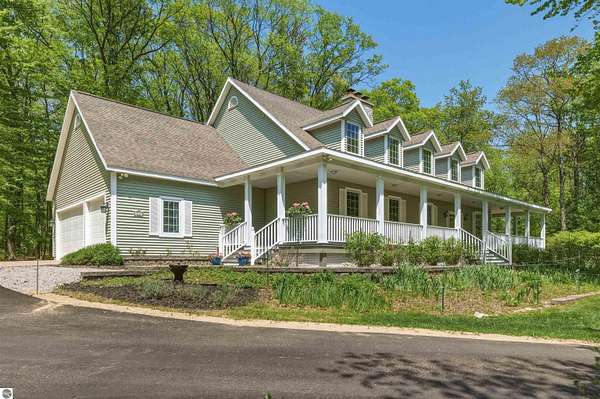 5.2 Acres of Land with Home for Sale in Williamsburg, Michigan