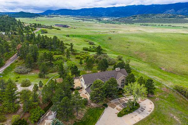 233 Acres of Land with Home for Sale in Larkspur, Colorado