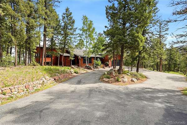 2 Acres of Land with Home for Sale in Evergreen, Colorado