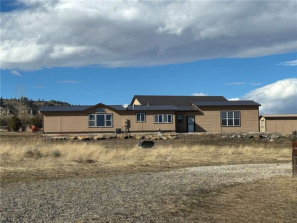 33.6 Acres of Agricultural Land with Home for Sale in Fromberg, Montana