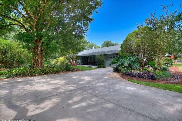 2.39 Acres of Land with Home for Sale in Winter Haven, Florida
