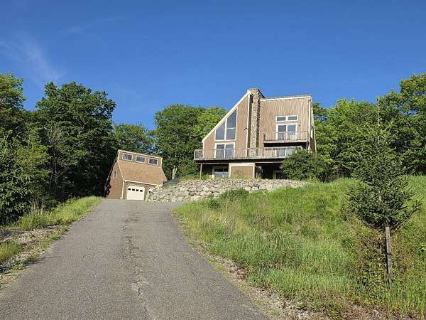 3.52 Acres of Land with Home for Sale in Holden, Maine
