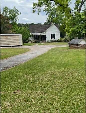 9.16 Acres of Land with Home for Sale in Hampton, Georgia