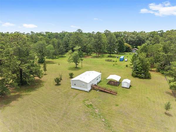 5.36 Acres of Land with Home for Sale in Alachua, Florida