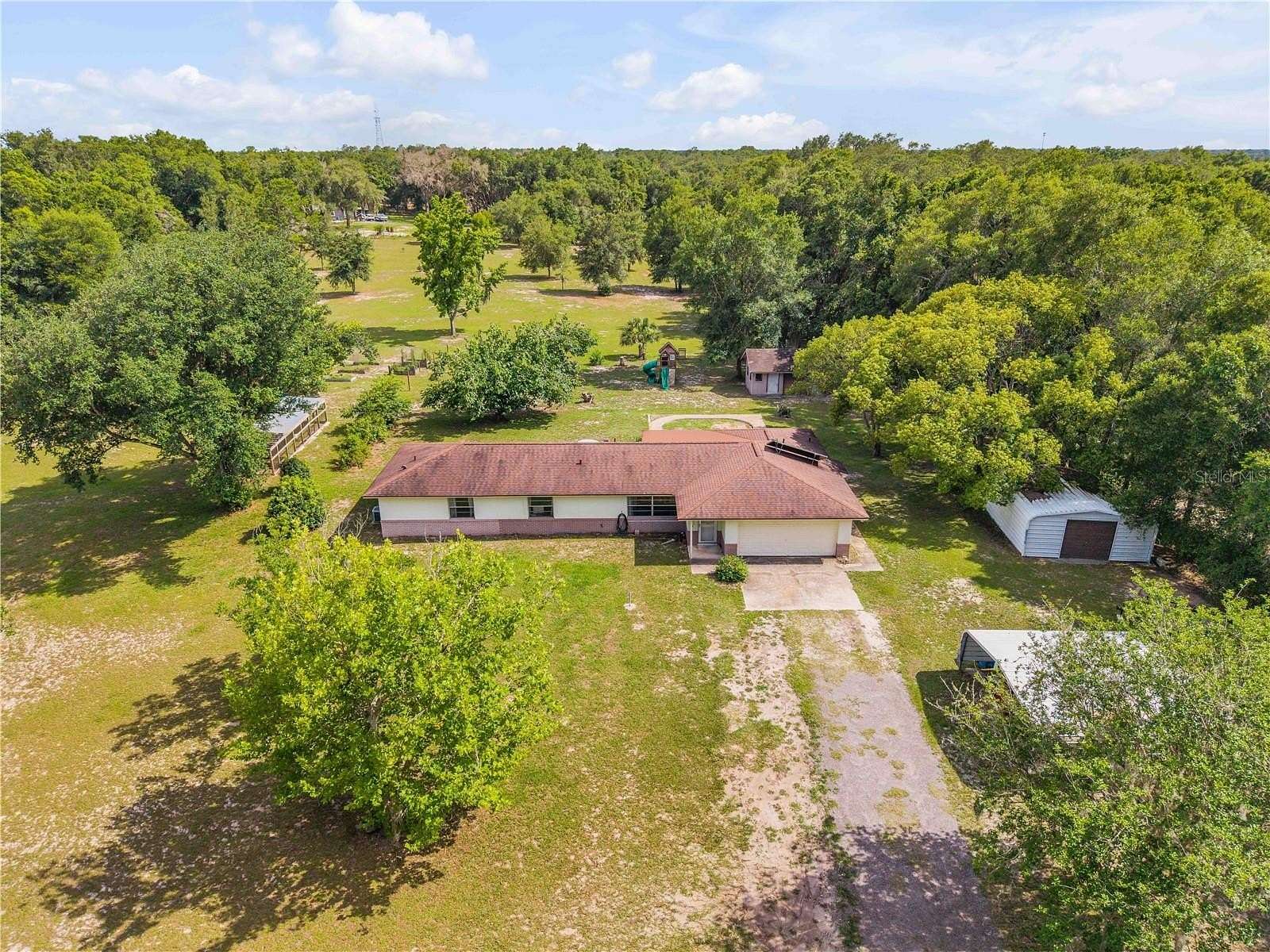 5 Acres of Land with Home for Sale in De Leon Springs, Florida