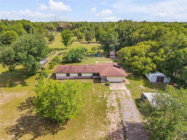 5 Acres of Land with Home for Sale in De Leon Springs, Florida