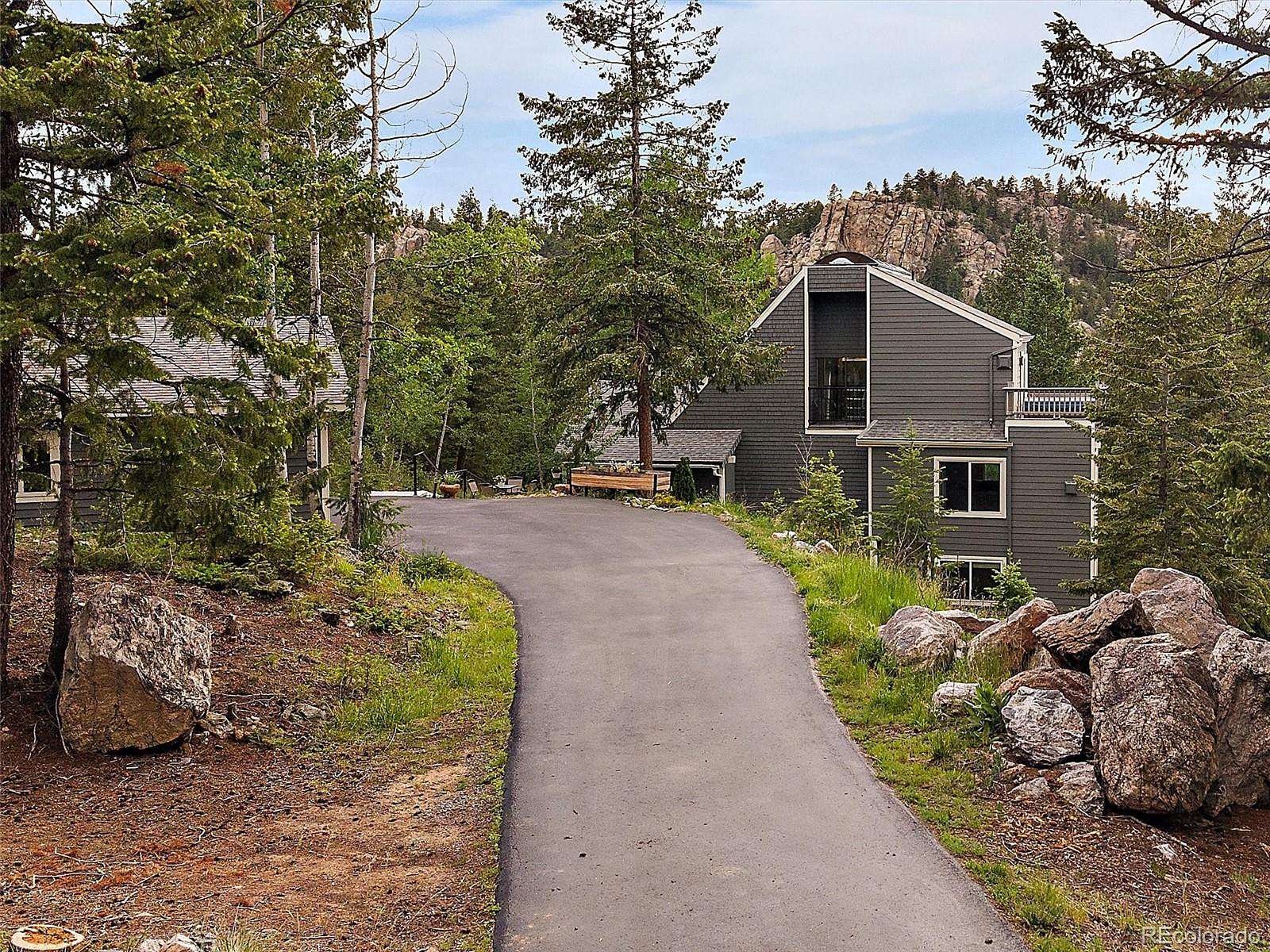 2 Acres of Land with Home for Sale in Evergreen, Colorado